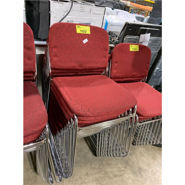 STACK OF 12 RED PATTERNED PADDED METAL FRAMED STACKING EVENT CHAIRS