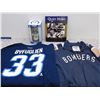 Image 1 : Lot of 4 Sports Items Old Time Football Bombers Sweater, Byfuglien 33 T-Shirt, Quiet Hero, PAWS Jets