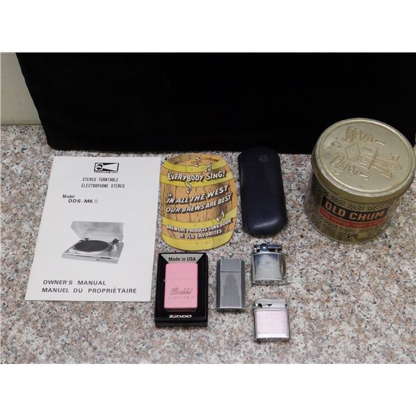 Junk Drawer of Lighters, Matte Pink, Tabacco Tin, Glasses, Turntable Manual, Songbook