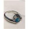 Image 4 : Ladies Blue Topaz Solitaire Gem in Hands .925 Silver Ring