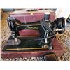 Image 2 : singer sewing machine with foot pedal and case - excellent original condition