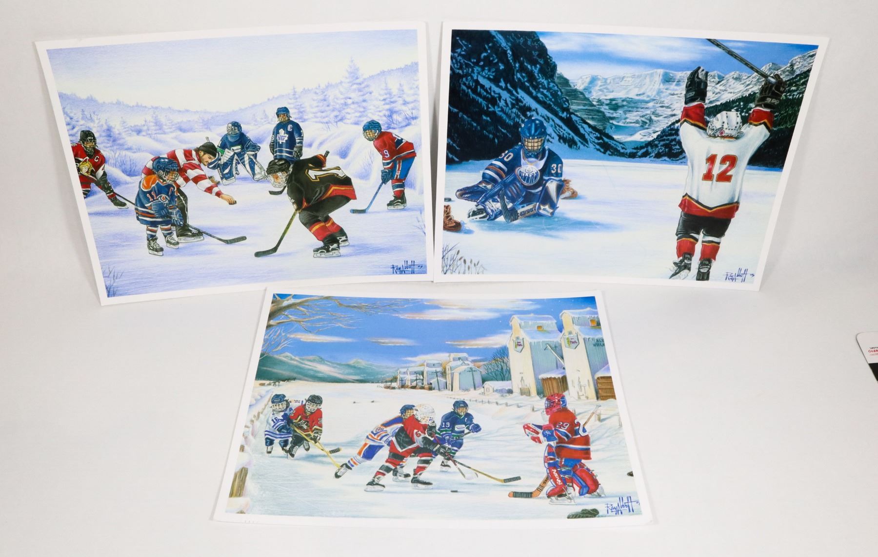 THREE HOCKEY THEMED PRINTS BY RAY ABBOTT