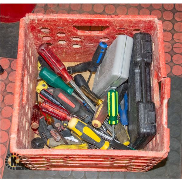 RED CRATE FULL OF SCREWDRIVERS AND NUT