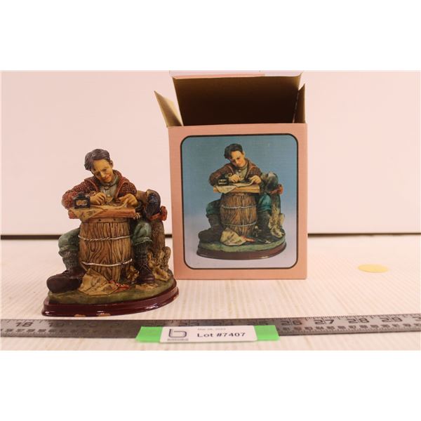 Man with Dog Figurine