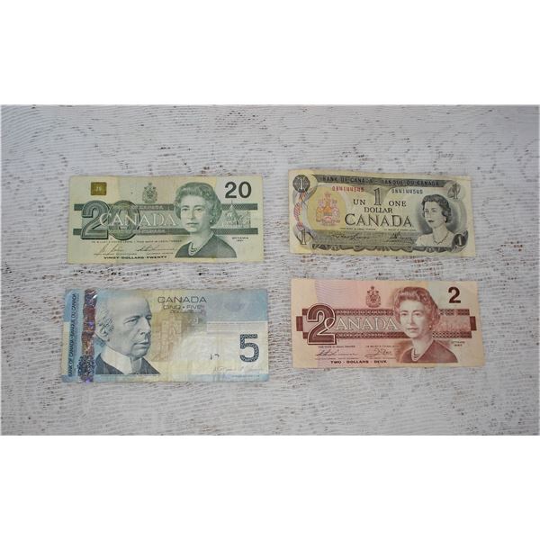 1 $20.00 bill  1 $5.00 bill 1 $2.00 bill and 1 $1.00 bill