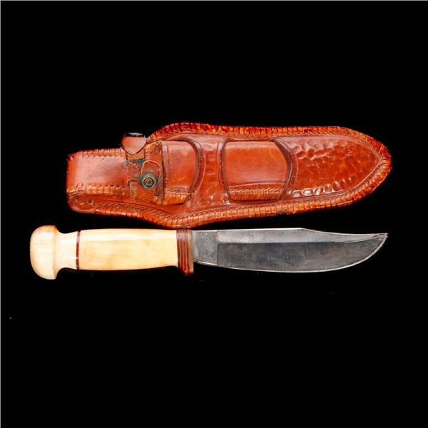 Bowie Knife in Leather Sheath.