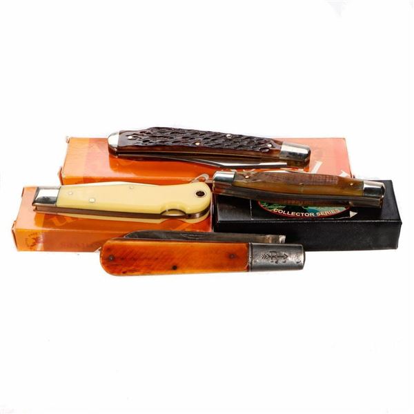 Three Russell Pocket Knives, and another.
