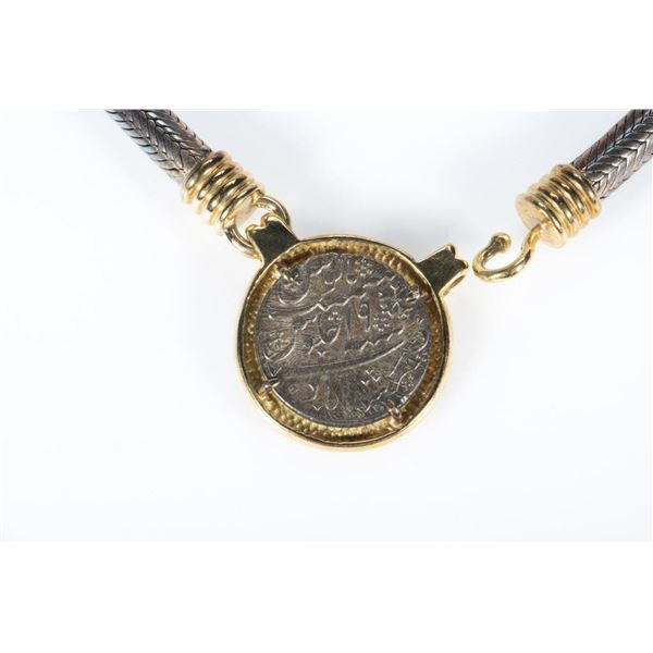 Coin, silver and yellow metal necklace.