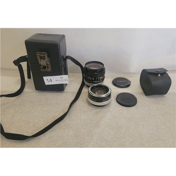 A Pair Of Camera Lenses With Cases