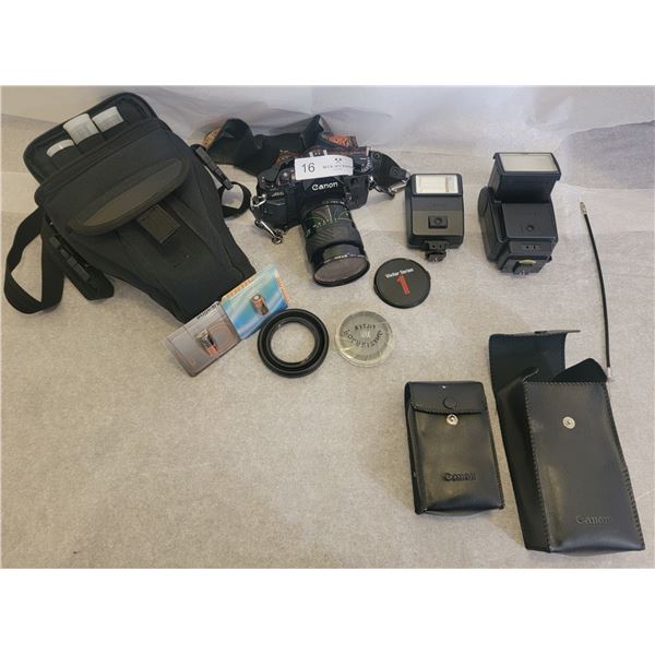 A Vintage Canon (A-1) Camera With Lens, Accessories, and 2 Flashes (Canon Speedlite 199A)