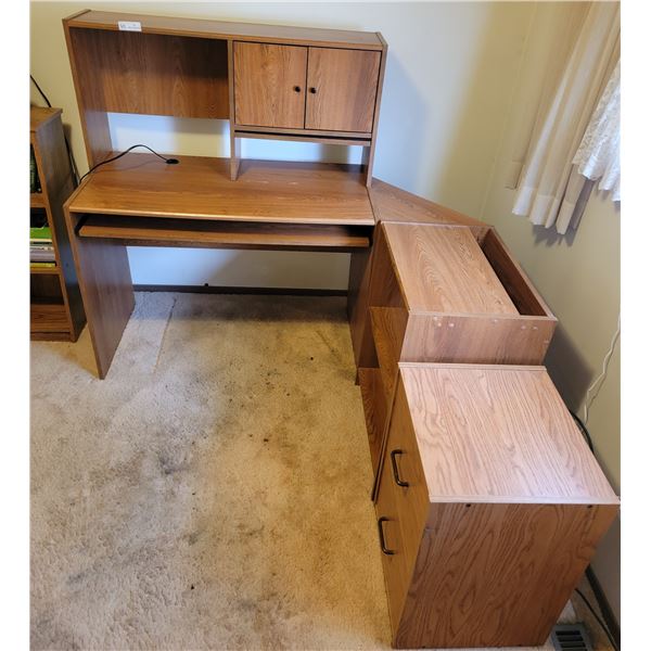 A Dependable Wooden Computer Desk, Accompanied By A Wooden File Cabinet
