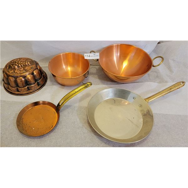 An Assortment Of Decorative Copper Dishware
