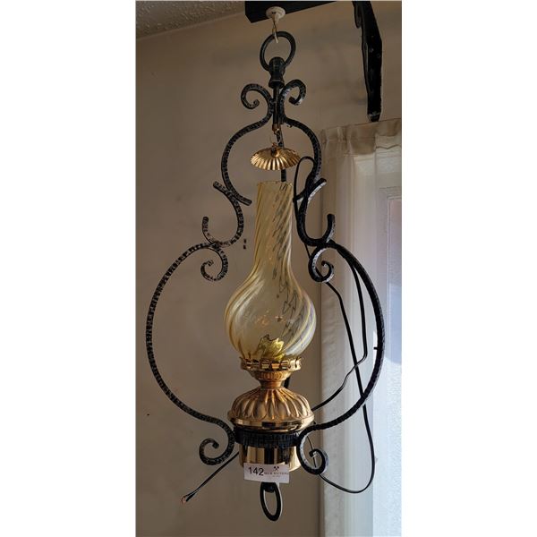 A Stunning Hanging Electronic Lantern With Gothic Decor
