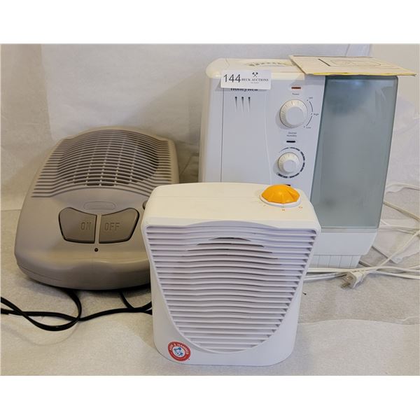 A Heated Fan, Small Fan By Arm and Hammer, And Humidifier
