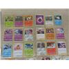 Image 2 : 60 Assorted Pokémon Cards in Binder