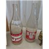 Image 2 : 2 Vintage 28oz Pop Bottles; Kik Cola, Wynola, Johnsons Cardboard Sign, Brass 