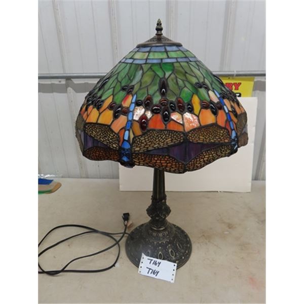 Lovely tiffany style lamp with stained glass & dragon fly motif.  16"L x 16"W x 23"H