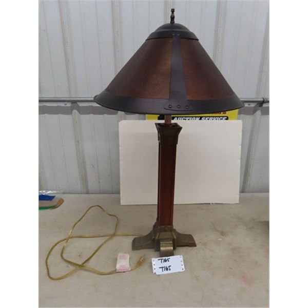 Mission style lamp with Micah like shade. The base of the lamp is wood and 