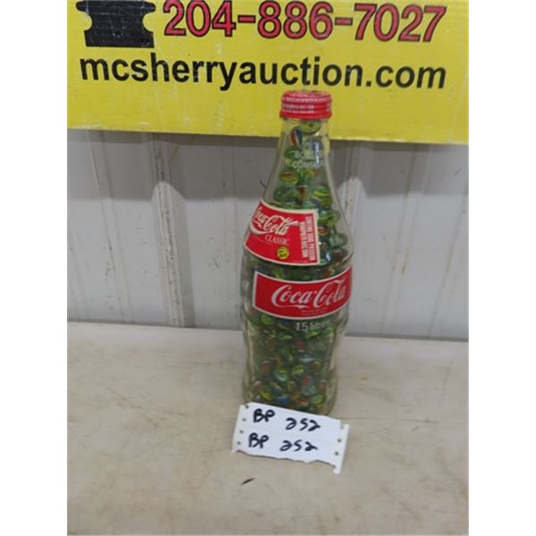 1.5L Coke Bottle Full of Marbles 