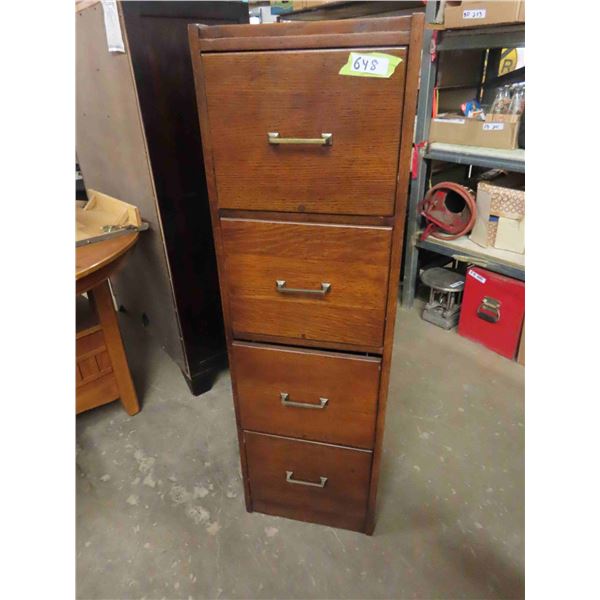 Mission style oak file cabinet.  You can use letter or legal-size files in this cabinet. 4