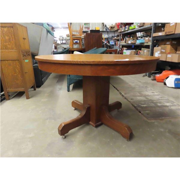 Vintage Antique Mission Oak round table 44” wide. In some areas it does show its 