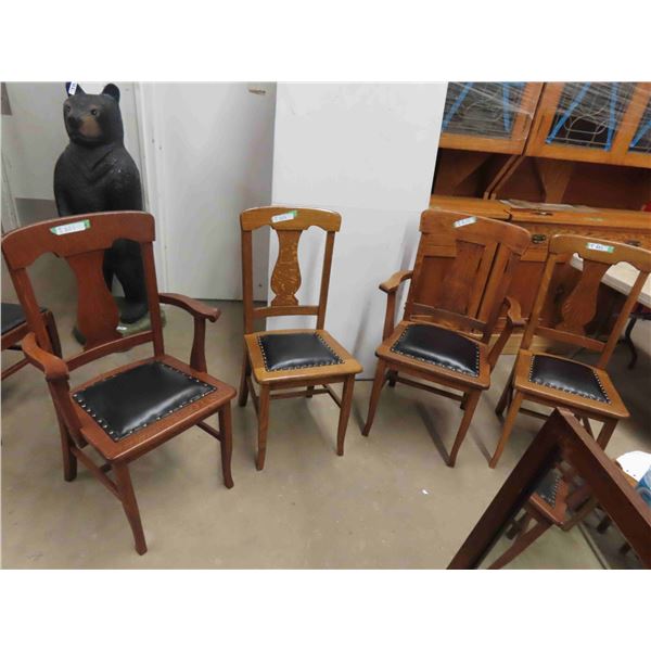 4 Antique Oak Dining Chairs- reupholstered with leather seat covers - purchased by 