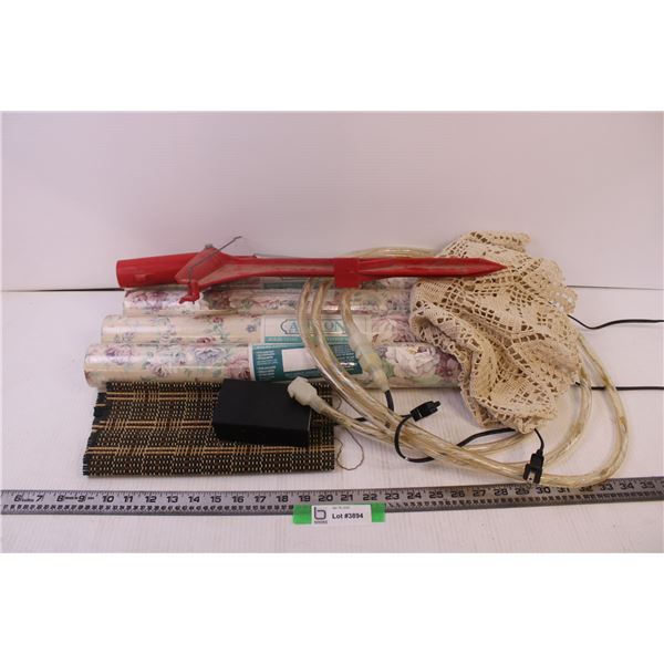 4 rolls of flowered wallpaper, fishing rod holder, rope lights(tested and working) doilie and placem