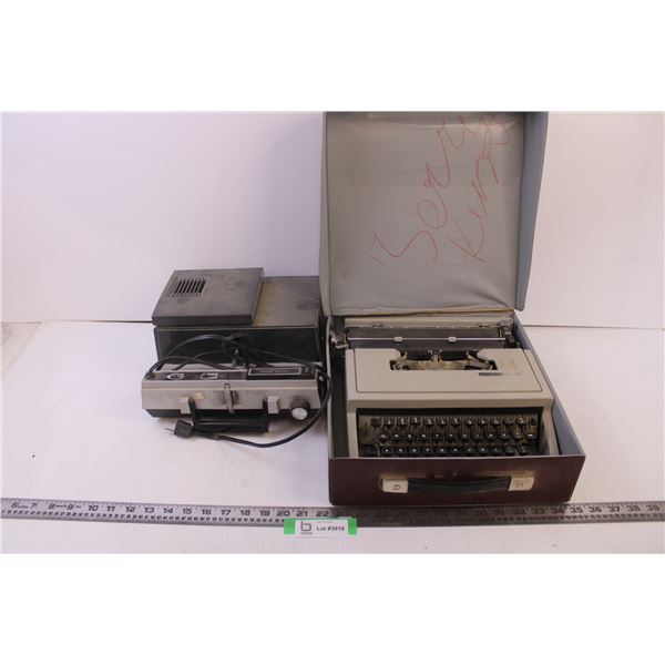 Old Projector and old ribbon typewriter in case