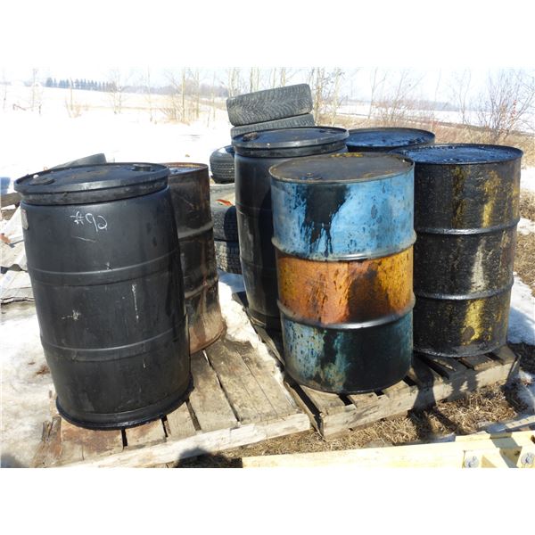 4- Metal oil barrels and 2- Plastic oil barrels 45 gallons
