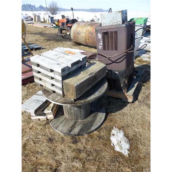 Wood blocking, spool, old oil heater, barrel and old elec. Motor