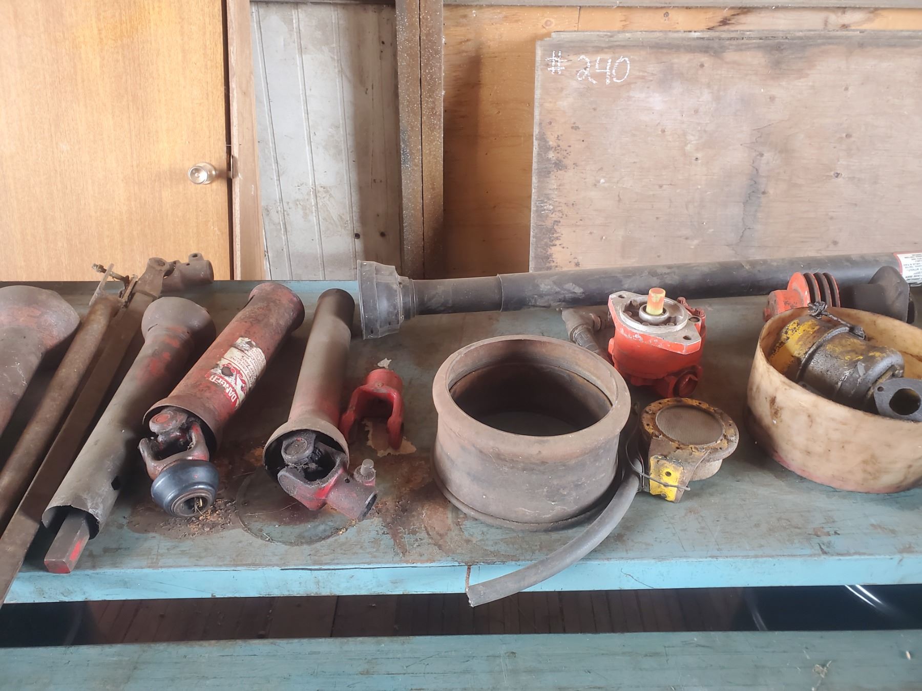 Approx. 9 PTO shafts, hyd. hose, tractor hyd. pump, water pump and misc.