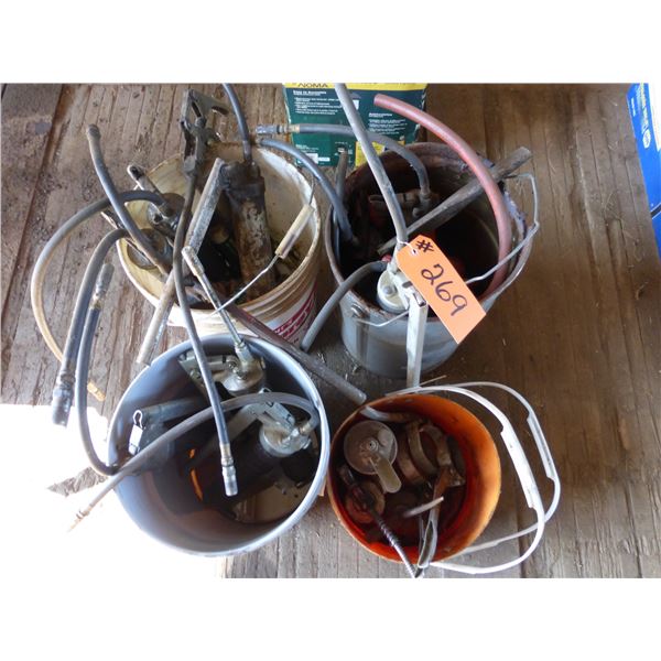 Various grease guns & oil cans