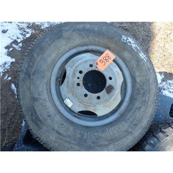 1- 235 85 16 tire & 8-hole rim and 1- 245 75R16 tire and rim