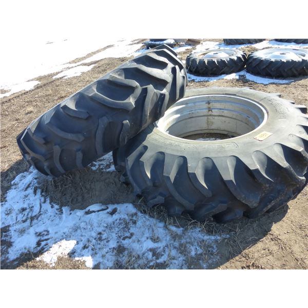 2- 18.4-34 tires & rims c/w fluid, appear good (so much each x2)