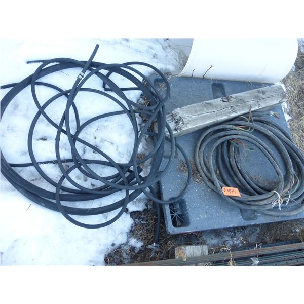 2- Rolls of heavy cord and roll of hose