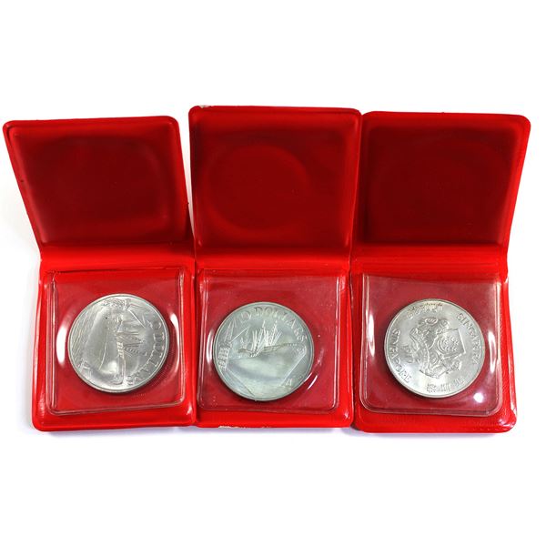 1976, 1977 & 1979 Singapore $10 Commemorative .500 Silver Coins in Folding Wallet Holders. 3pcs