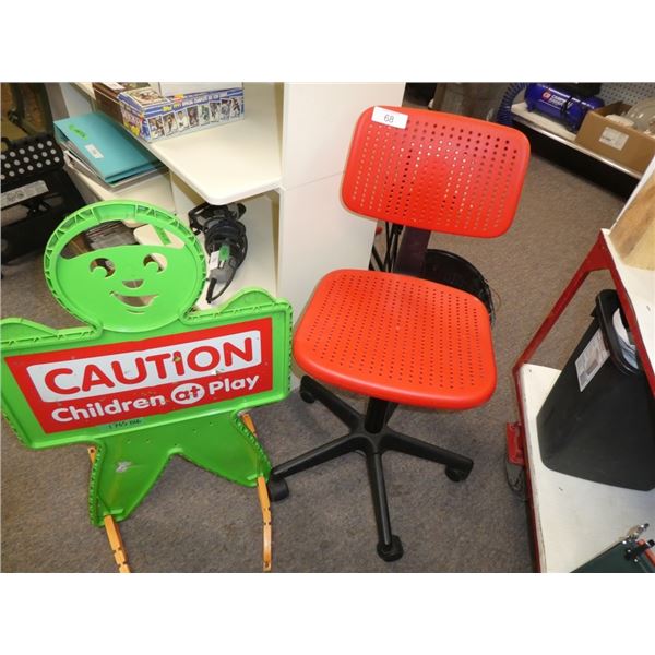 office chair, caution children at play sign