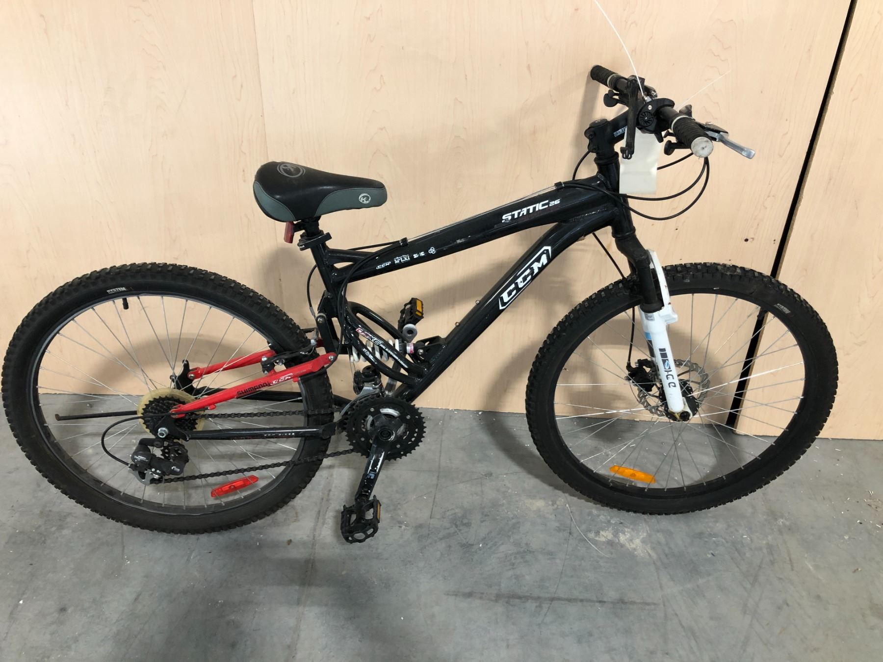 Ccm Cycle BLACK CCM STATIC 26 FULL SUSPENSION 21 SPEED MOUNTAIN BIKE - Able Auctions