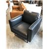 Image 2 : NATUZZI EDITIONS  BLACK LEATHER ARMCHAIR