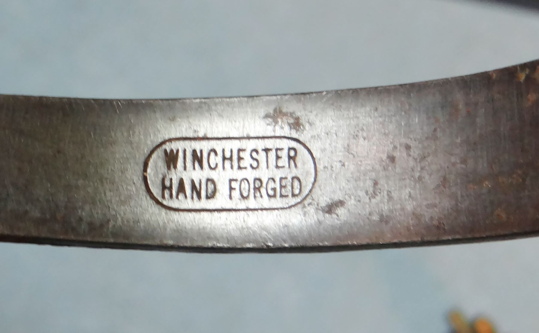 Hand gal leg spurs, silver and copper mtd., stamped Winchester, made in Korea.