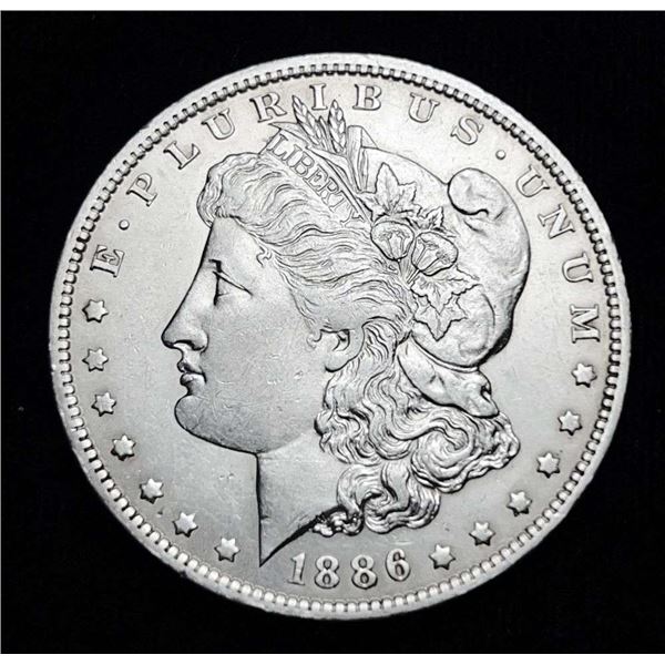 1886-O Morgan Silver Dollar AU58