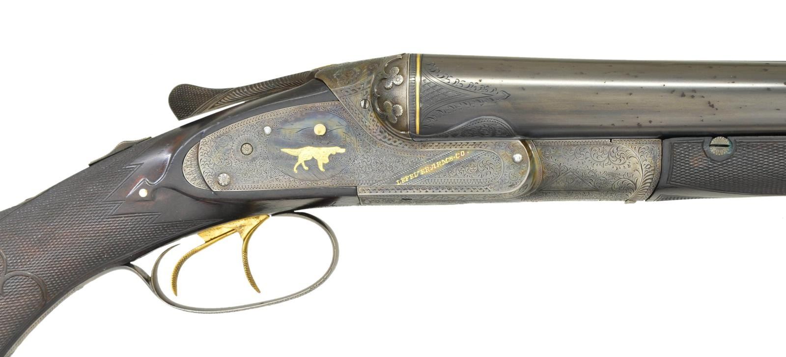 HIGH GRADE OPTIMUS (?) LEFEVER HAMMERLESS SHOTGUN.