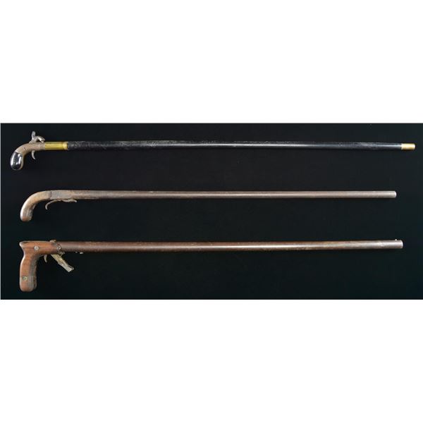 3 PERCUSSION CANE GUNS.