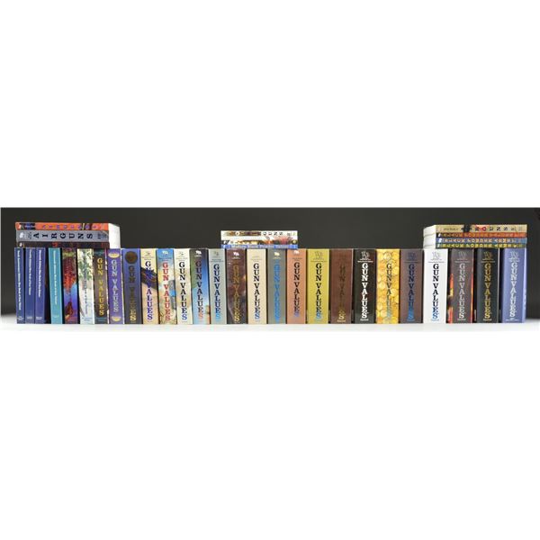 38 VOLUMES OF GUN VALUE BLUE BOOKS.