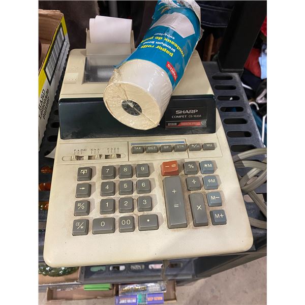 Sharp adding machine and paper rolls