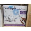 Image 1 : Waterpik Water Flosser Twin Pack