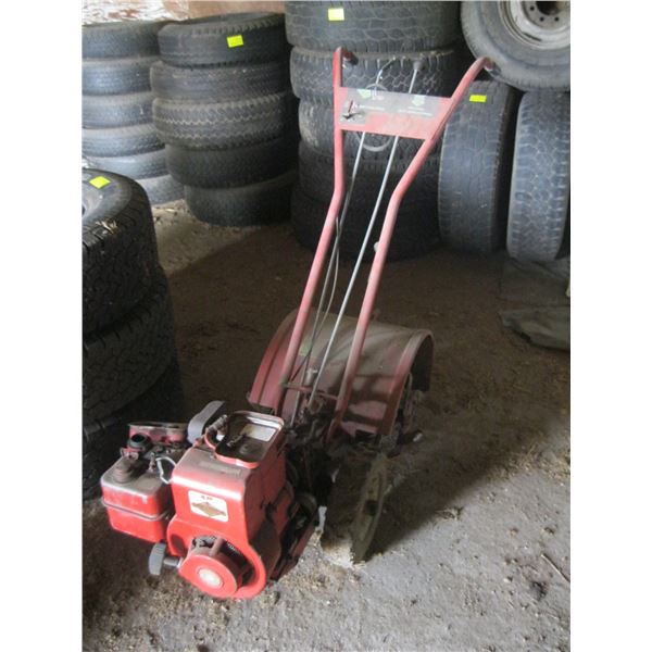 TROY BUILT REAR TINE ROTOTILLER, CONDITION UNKNOWN, MOTOR SEIZED