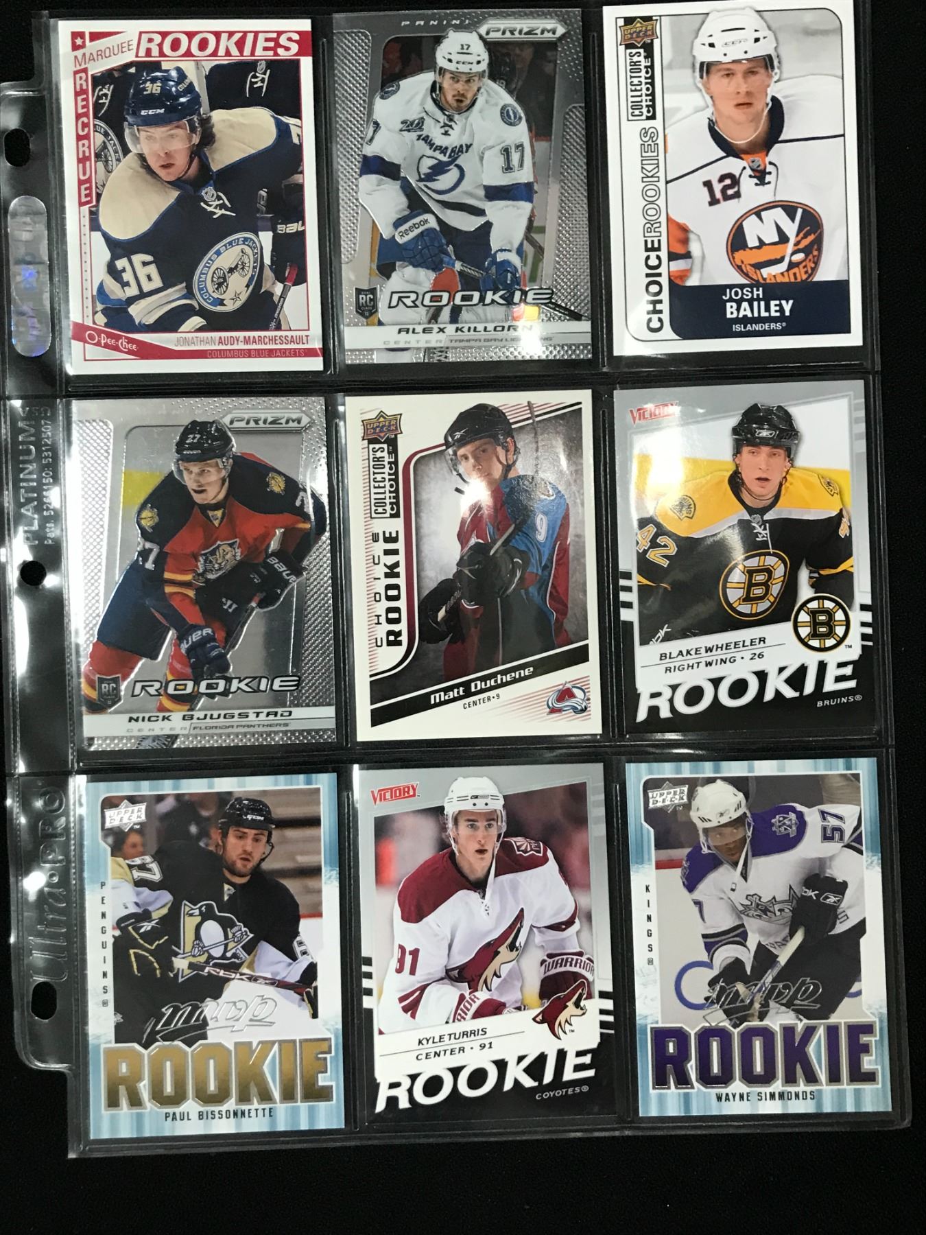 LOT OF 9 NHL ROOKIE CARDS