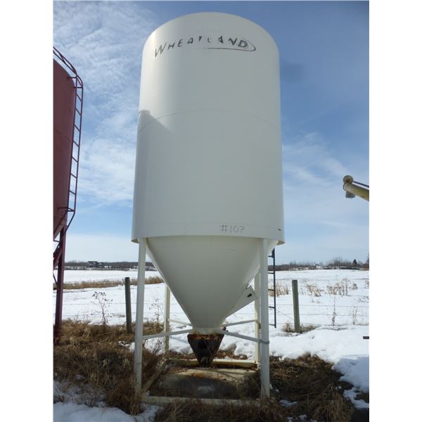 Wheatland - approx. 100" dia. 2-ring hopper bin c/w skid & approx. 500 lbs of fert. (to be moved by 