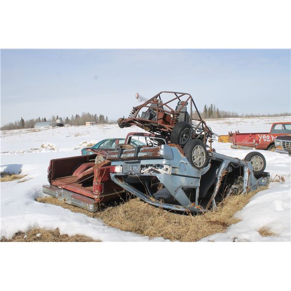 Balance of scrap iron- including vehicles, old equip., large piles of scrap (Buyer responsible to lo